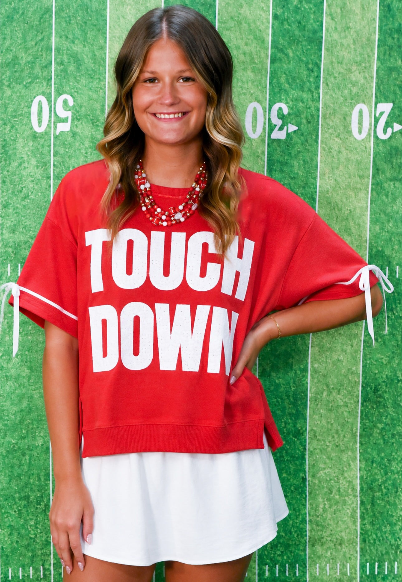 Eyelet Touchdown Spirit Top