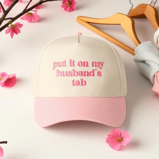 Put It On My Husbands Tab Trucker Hat